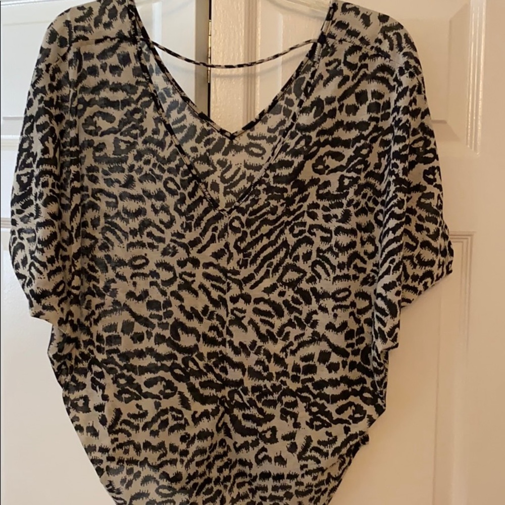 Slightly open back top